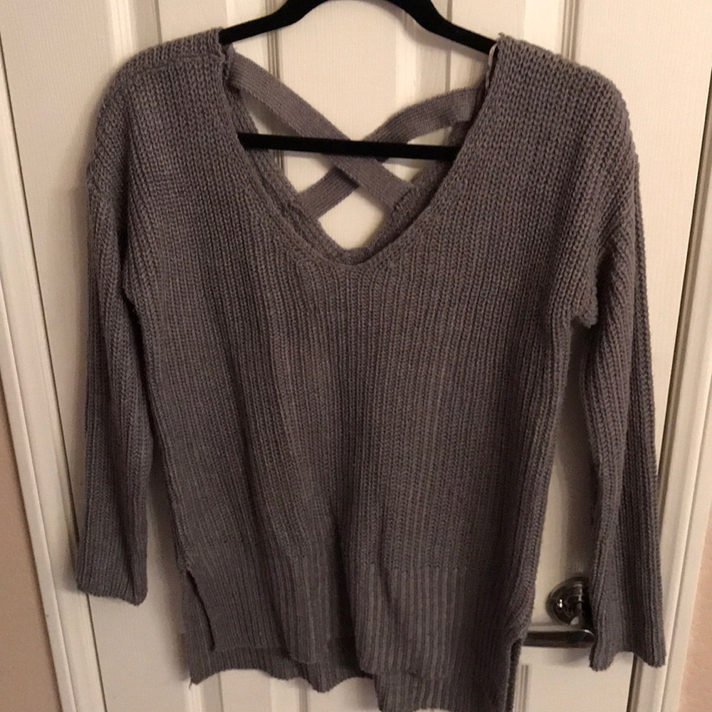 Gray sweater with cross detail on back